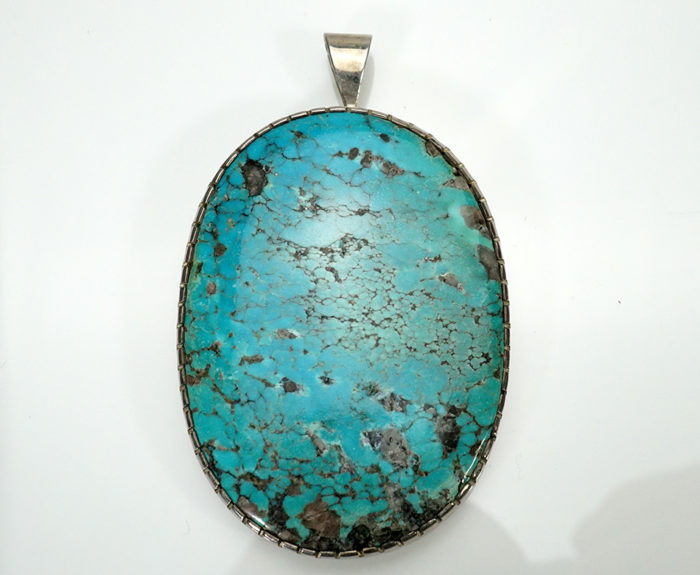 Necklace with turquoise cabochon
