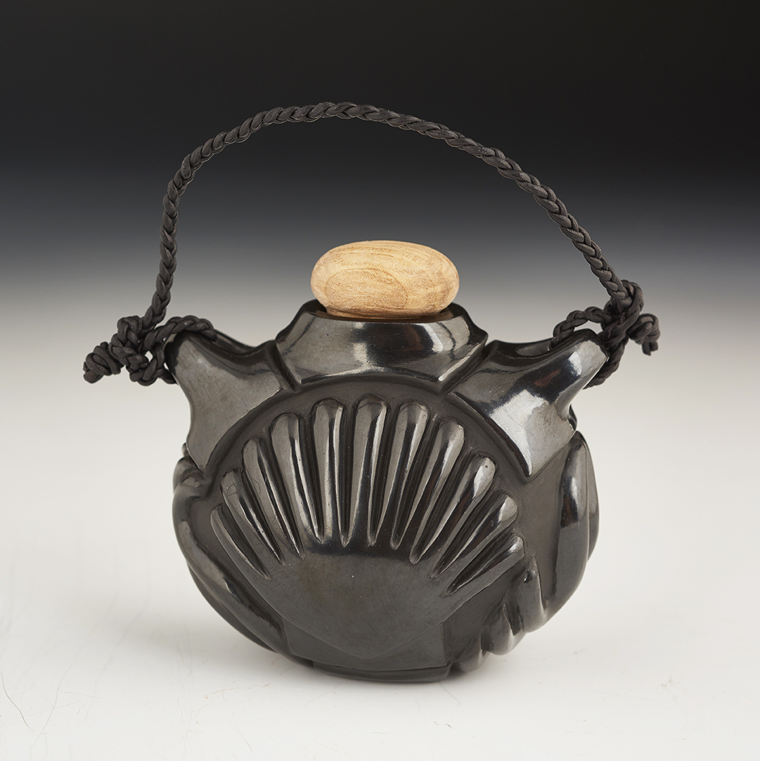 Miniature Black Canteen with Carved Designs