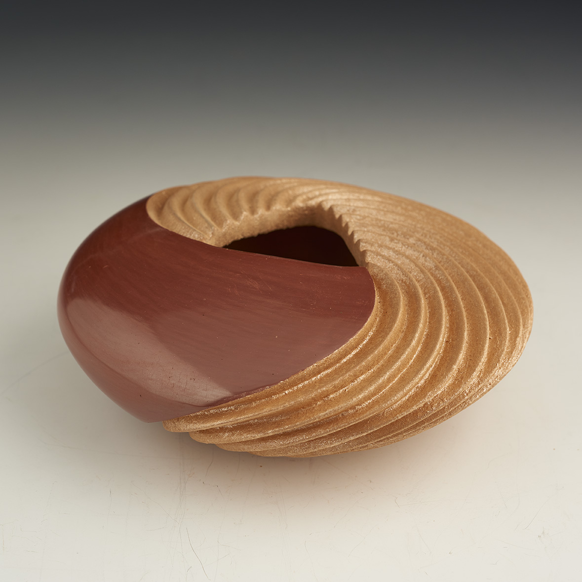 Red Polished and Micaceous Swirled and Ribbed bowl