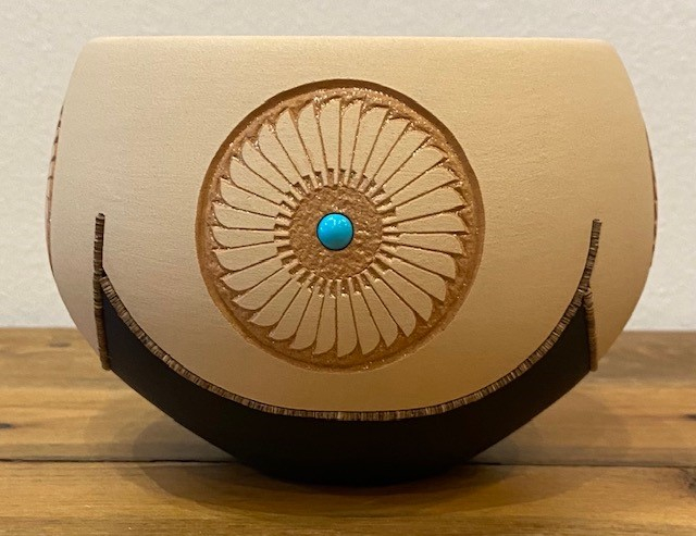 Beautiful Bowl with Feather Design highlighted with Turquoise Dots.  Inlaid Heishi Beads.