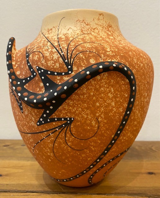 Two Lizards circle this large fine jar by Zuni Artists Deldrick and Lorinda Cellicion