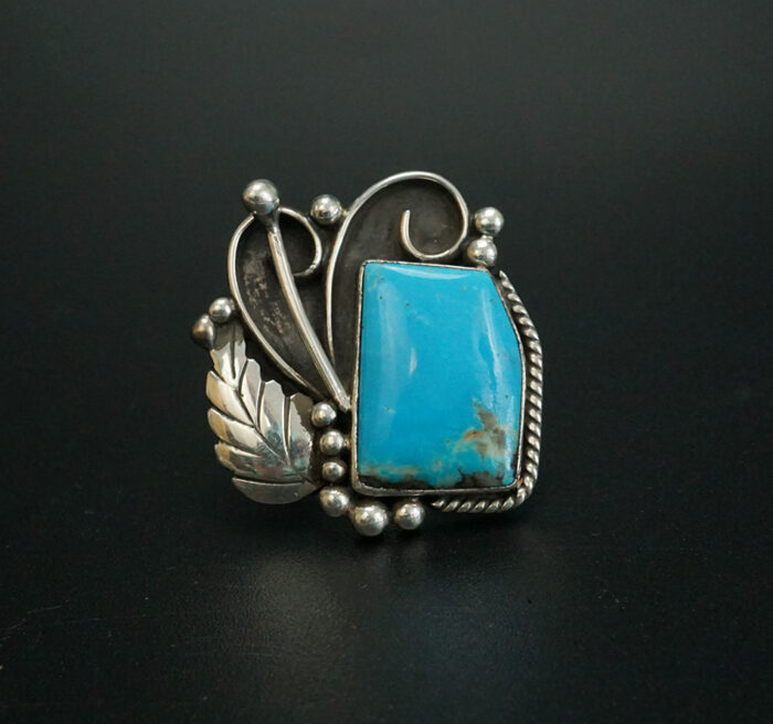 Sterling silver ring with Kingman turquoise and hand-wrought leaves